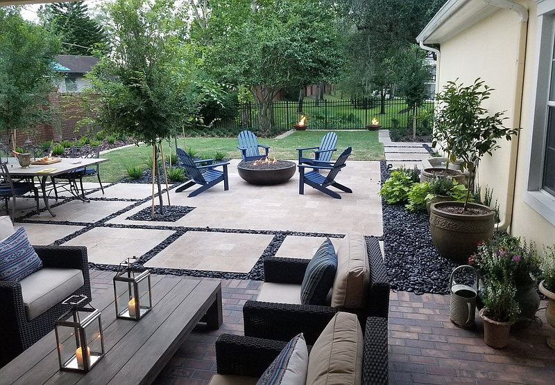 The new yard has three inviting rooms outdoors -- a living room, a dining area and a hearth room with chairs circling a fire, greatly expanding the home’s usable space.

Courtesy of Tony Evans