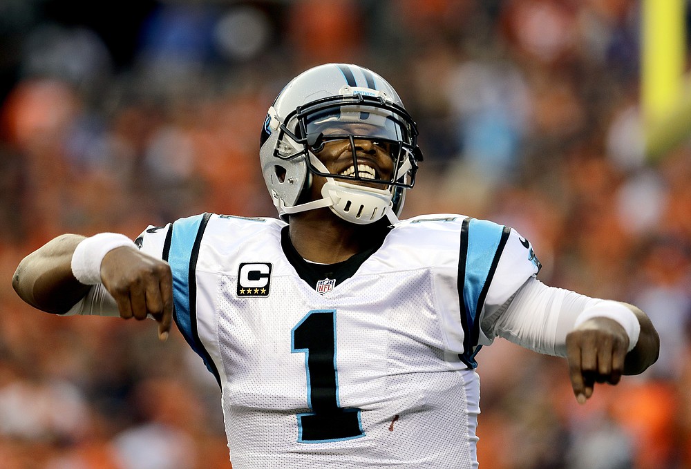 FILE - In this Sept. 8, 2016, file photo, Carolina Panthers quarterback Cam Newton (1) celebrates a touchdown pass against the Denver Broncos during the first half of an NFL football game, in Denver. The New England Patriots have reached an agreement with free-agent quarterback Cam Newton, bringing in the 2015 NFL Most Valuable Player to help the team move on from three-time MVP Tom Brady, a person with knowledge of the deal told The Associated Press. The one-year deal is worth up to $7.5 million with incentives, the person said, speaking on the condition of anonymity because he was not authorized to discuss it publicly. (AP Photo/Joe Mahoney)