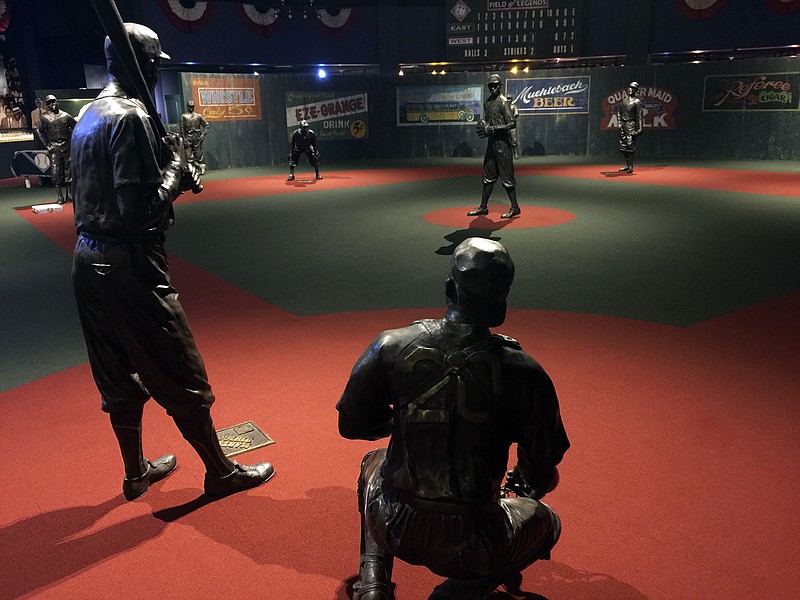 In this undated photo provided by the Negro Leagues Baseball Museum, the Field of Legends at the Negro Leagues Baseball Museum is viewed in Kansas City, Mo. The display features 10 life-size statues of Negro League greats cast in position as if they were playing a game. Former President Barack Obama tipped his cap. So did three other former presidents and a host of prominent civil rights leaders, entertainers and sports legends in a virtual salute to the 100-year anniversary of the founding of baseball’s Negro Leagues. The campaign launched Monday with photos and videos from, among others, Hank Aaron, Rachel Robinson Derek Jeter, Colin Powell, Michael Jordan, Obama and presidents George W. Bush, Bill Clinton and Jimmy Carter at http://tippingyourcap.com. - Photo by Negro Leagues Baseball Museum via The Associated Press story.lead_photo.caption