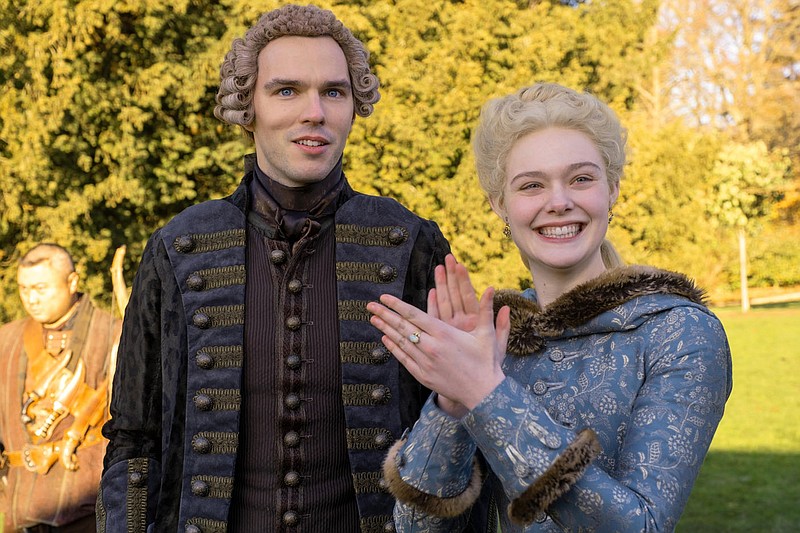Peter (Nicholas Hoult) and Catherine (Elle Fanning) perform in a scene from Hulu’s “The Great,” a new period drama that Tony McNamara did not expect to make. The series sees historical fact as a jumping off point.
(Hulu/TNS/Ollie Upton)