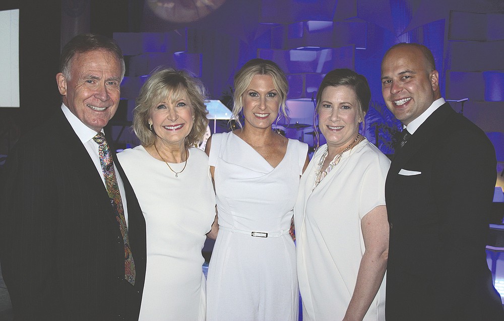NWA Democrat-Gazette/CARIN SCHOPPMEYER David and Cathy Evans (from left) with their family Erin Bridges and Linden and Brandon Seims help support ACH.