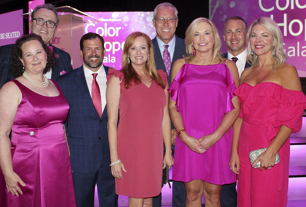 NWA Democrat-Gazette/CARIN SCHOPPMEYER Mary and Fred Scarborough (from left), Kyden and Melanie Reeh, Mike and Jill Sewell and Tony and Shelli Engle help support Arkansas Children's Northwest on Aug. 3.