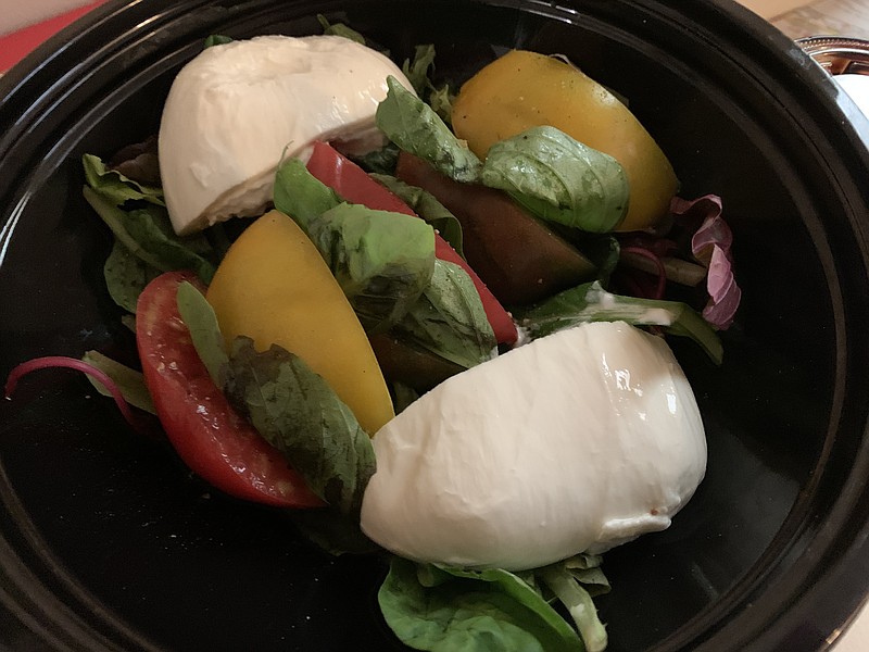 Boulevard Bread Co.’s Caprese Salad consisted of three kinds of heirloom tomatoes, fresh basil and fresh mozzarella with olive oil and a balsamic reduction.

(Arkansas Democrat-Gazette/Eric E. Harrison)