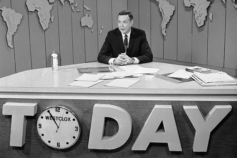 FILE - In this March 10, 1966 file photo, Hugh Downs hosts the "Today"show on NBC.  Downs, a genial and near-constant presence on television from the 1950s through the 1990s, has died. His family said Downs died of natural causes Wednesday, July 1, 2020, in Scottsdale, Ariz. He was 99. Downs was a host of the "Today" show on NBC, worked on the "Tonight" show when Jack Paar was in charge, and hosted the long-running game show "Concentration." (AP Photo/Jack Kanthal, File)