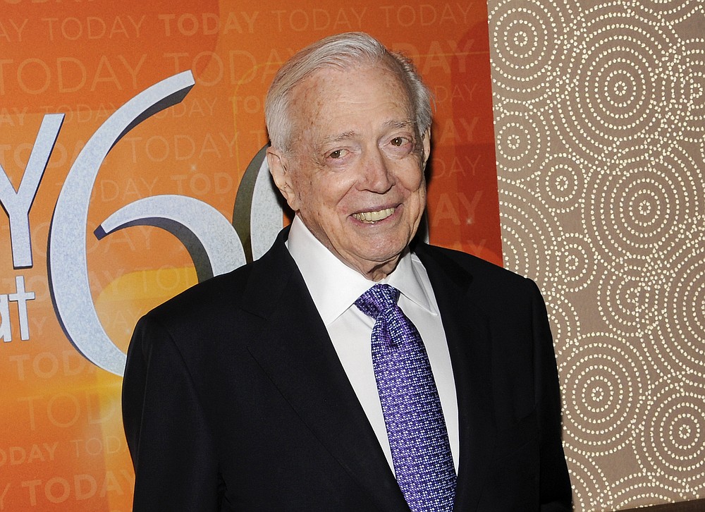 FILE - This Jan. 12, 2012 file photo shows Hugh Downs at the "Today" show 60th anniversary celebration in New York. Downs, a genial and near-constant presence on television from the 1950s through the 1990s, has died. His family said Downs died of natural causes Wednesday, July 1, 2020, in Scottsdale, Ariz. He was 99. Downs was a host of the ‘Today’ show on NBC, worked on the ‘Tonight’ show when Jack Paar was in charge, and hosted the long-running game show "Concentration." (AP Photo/Evan Agostini, File)