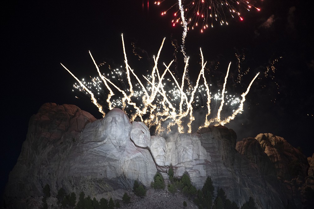 Fireworks light the sky at Mount Rushmore National Memorial, Friday, July 3, 2020, near Keystone, S.D., after President Donald Trump spoke. (AP Photo/Alex Brandon)