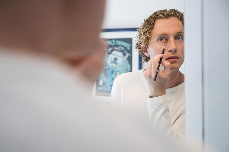 Axel Getz, 24, is part of a growing number of men interested in makeup. A recent poll showed about one third of men under 45 are willing to try cosmetics. (Bloomberg photo by Adam Glanzman)