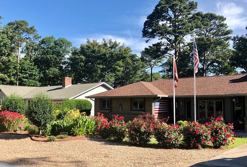 Photo submitted The Hilgart's home on Deddinton Drive displays a beautifully landscaped front yard.