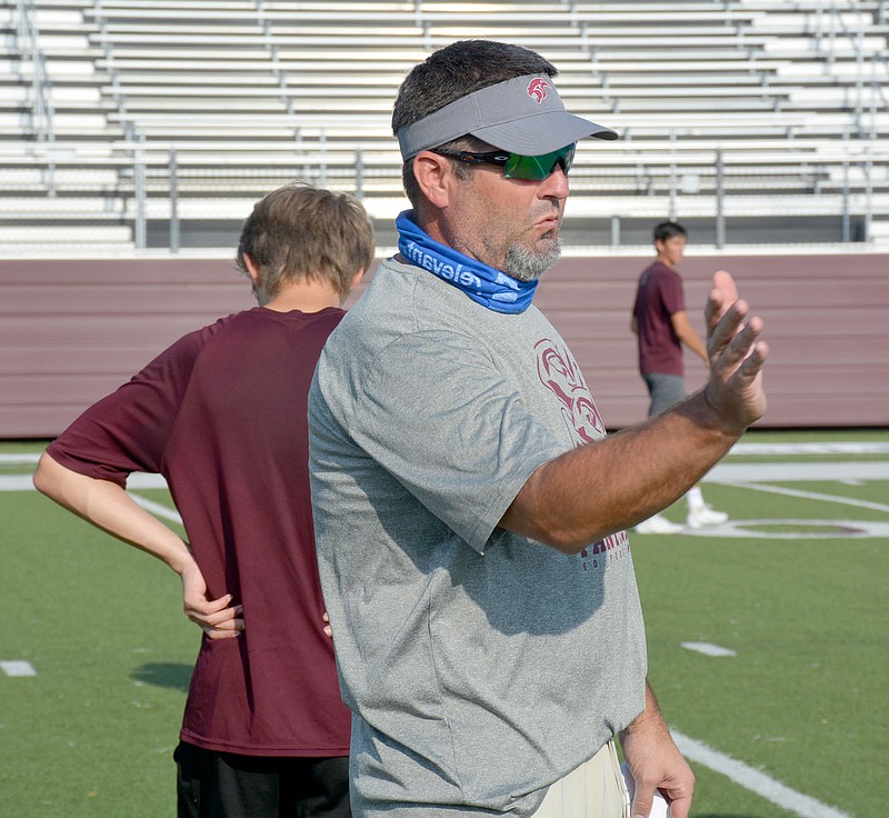 Graham Thomas/Herald-Leader
New Siloam Springs assistant football coach Aaron Meier explains a pass route during football practice on Monday at Panther Stadium. Meier comes to the Panthers after spending 10 years as head coach at Catoosa, Okla.