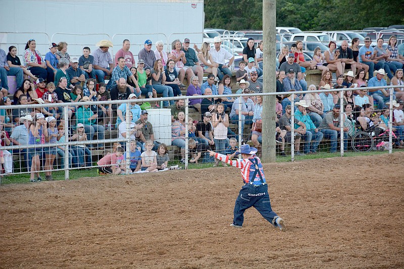 Graham Thomas/Herald-Leader
Rodeo clown Michael "Goobie" Smith gets the crowd fired up at the 2019 Siloam Springs Rodeo.