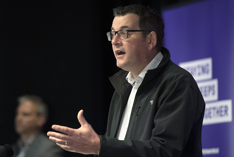 Victorian Premier Daniel Andrews briefs the media on conditions concerning the COVID-19 situation in Melbourne, Australia, on Monday, July 6, 2020. Andrews announced that the state border with New South Wales will be closed from late Tuesday night in an agreement between the two state premiers and Prime Minister Scott Morrison. (AP Photo/Andy Brownbill)