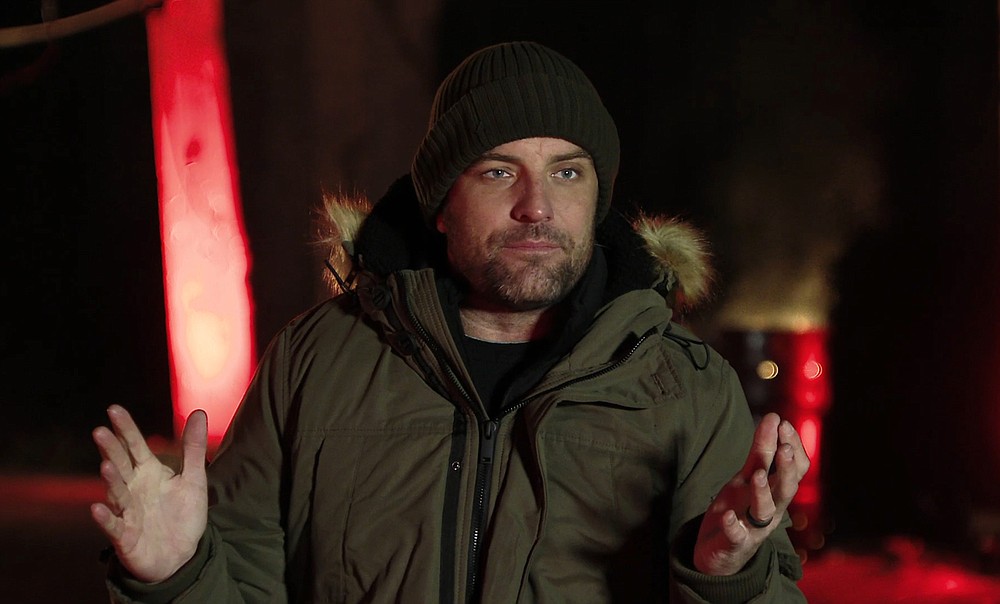 This image released by MTV shows T.J. Lavin, host of MTV’s reality competition series, “The Challenge.” Currently airing its 35th season, the coronavirus pandemic has allowed “The Challenge” to draw in new viewers to its consistently loyal fanbase. This season’s premiere gained its highest rating in more than 14 years. (MTV via AP)