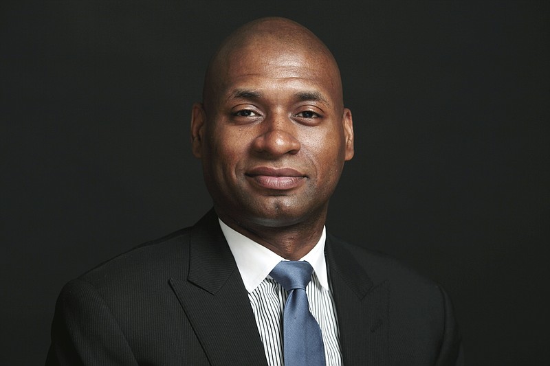 This 2010 photo shows New York Times columnist Charles M. Blow, who is working on a book “The Devil You Know: A Black Power Manifesto.” The book will be published in February, Harper announced Wednesday, July 8, 2020. Blow will combine political history and personal reflections for a “race book” he felt compelled to take on amid the coronavirus pandemic and Black Lives Matters protests. Blow, 49, has been a Times Op-Ed columnist since 2008. He is also the author of “Fire Shut Up in My Bones,” a memoir released in 2014. (The New York Times via AP)