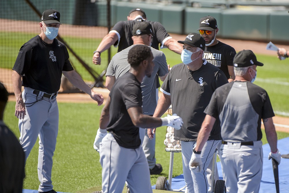 Chicago White Sox Manager Rick Renteria works his players during the first baseball practice of the restarted 2020 MLB season at Guaranteed Rate Field on Friday, July 3, 2020, in Chicago. (AP Photo/Mark Black)