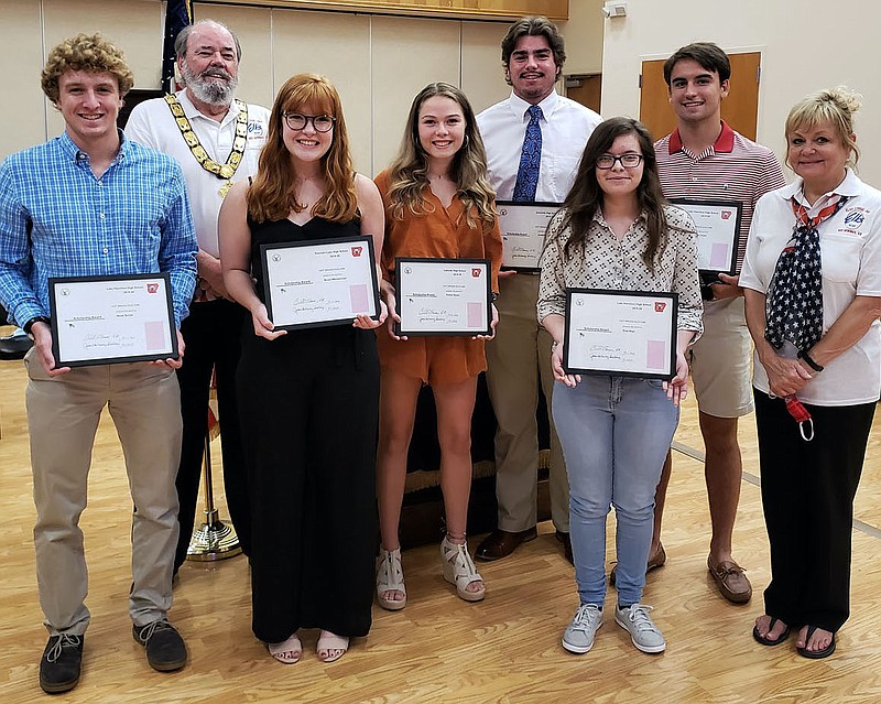 Front, from left, are Noah Smith, Lake Hamilton High School; Grace Westerman, Fountain Lake High School; Cailee Stone, Lakeside High School; Zoie Keys, Lake Hamilton High School; and Jackie Holloway, Scholarship Committee Chairperson; and back, from left, are Bill Sams, Exalted Ruler; Joseph Benson, Jessieville High School; and Pearson Hafer, Lake Hamilton High School. - Submitted photo