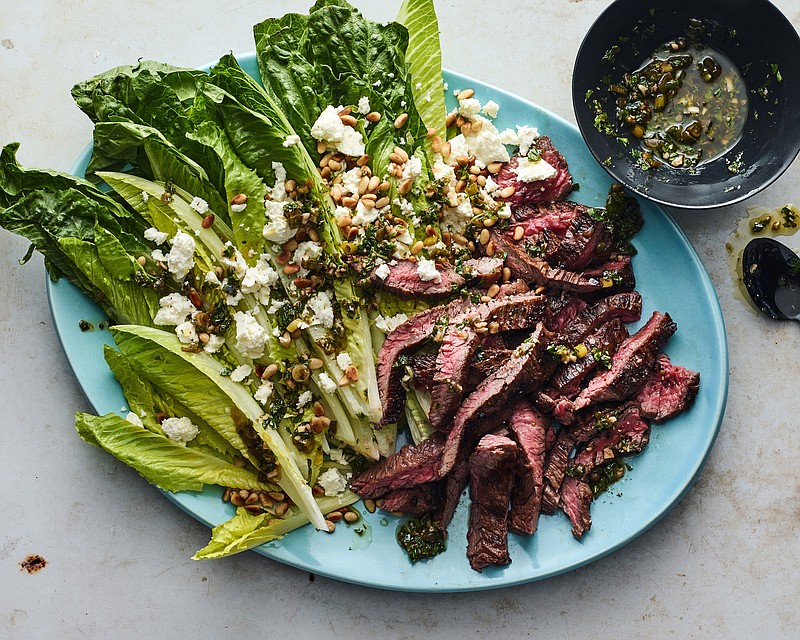 Lidey Hueck’s skirt steak with salsa verde salad. Dinner would be just as delicious if you grilled chicken, fish or more vegetables instead of steak. (The New York Times/Andrew Purcell)