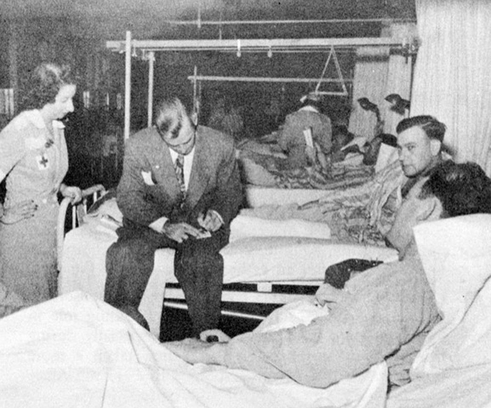 In 1946, movie star and Hot Springs native Alan Ladd signs autographs for patients at the Army and Navy General Hospital. Photo is courtesy of the Garland County Historical Society. - Submitted photo