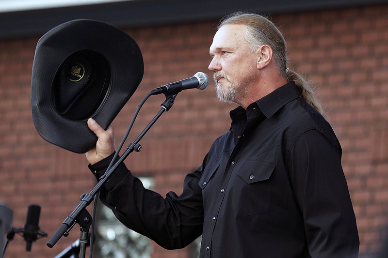 Trace Adkins tips his hat after performing during a memorial service for country music star Charlie Daniels Wednesday, July 8, 2020, in Mount Juliet, Tenn. Daniels died Monday, July 6. (AP Photo/Mark Humphrey)