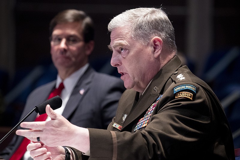 Defense Secretary Mark Esper, left, listens as Chairman of the Joint Chiefs of Staff Gen. Mark Milley testifies during a House Armed Services Committee hearing Thursday on Capitol Hill in Washington. - Michael Reynolds/Pool via AP