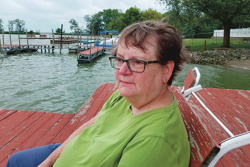 In this August 2017 photo, Associated Press journalist Mark Gillispie’s wife, Mary Lou Gillispie, sits for a photo in Marblehead, Ohio. Mary Lou died from cancer in late April 2020. (AP Photo/Mark Gillispie)