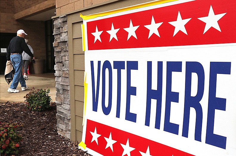 An man enters the Hot Springs Mall early voting location on March 2. - Photo by Richard Rasmussen of The Sentinel-Record