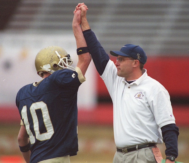 Arkansas Democrat-Gazette/KARL A. STOLLEIS
Rhett Lashlee, left, and Gus Malzahn celebrate a Shiloh Christian touchdown in the 1999 state championship game against Carlisle. Lashlee starred for three seasons at Shiloh Christian, leading the Saints to a pair of state championships. Malzahn is now the head coach at Auburn, and Lashlee is the offensive coordinator at the University of Miami.
