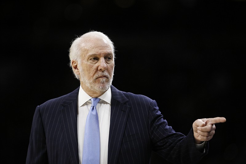 San Antonio Spurs coach Gregg Popovich points to his bench during the first half of a Nov. 22, 2019, NBA game against the Philadelphia 76ers in Philadelphia. Freshmen at the United States Air Force Academy are called doolies, and the experience for those first-year cadets can be extremely difficult. Popovich, class of 1970, hasn’t forgotten those days. And for the San Antonio coach, a couple days of lockdown at Walt Disney World brought back the memories of doolie life. - Photo by Matt Slocum of The Associated Press