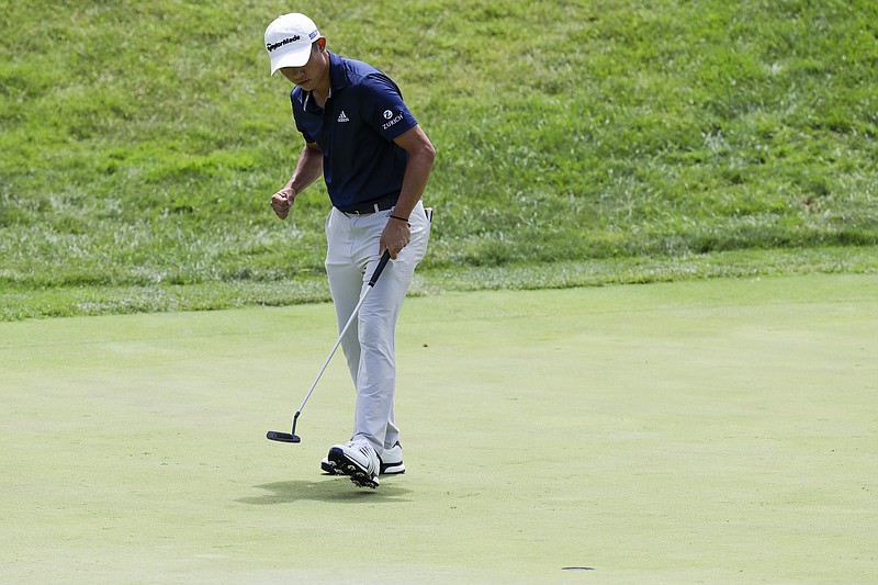 Collin Morikawa reacts to a putt on the 17th hole during the final round of the Workday Charity Open Sunday in Dublin, Ohio. - Photo by Darron Cummings of The Associated Press