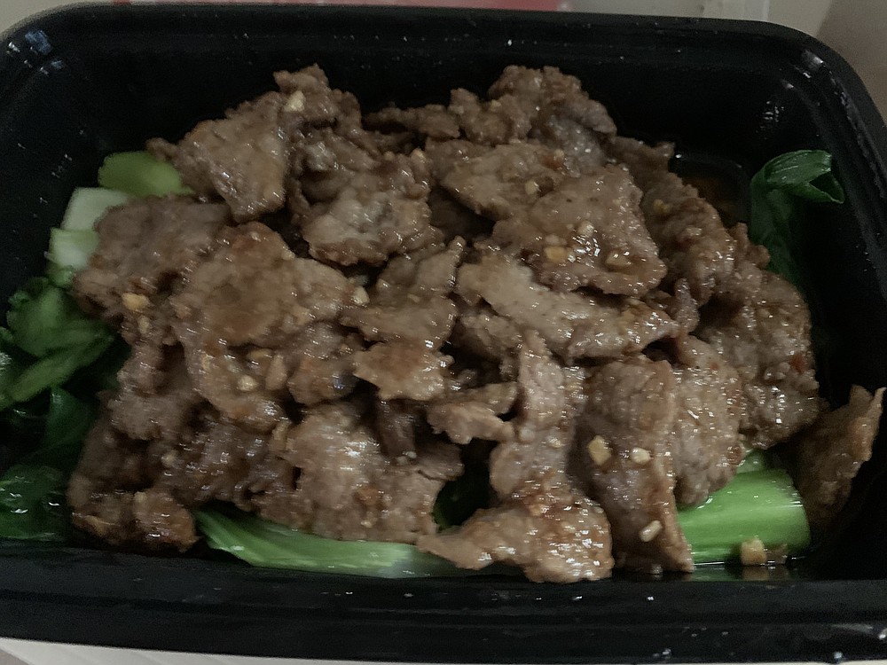 Chi’s Chinese Cuisine's non-Szechuan version of Beef in Sa Cha Sauce comes on a bed of bok choy.
(Arkansas Democrat-Gazette/Eric E. Harrison)
