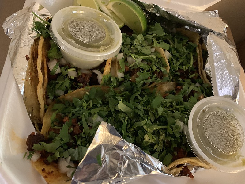 You get five street tacos — in this case, al pastor — for the price of four on Tuesdays at the Grills on Wheels food truck.
(Arkansas Democrat-Gazette/Eric E. Harrison)