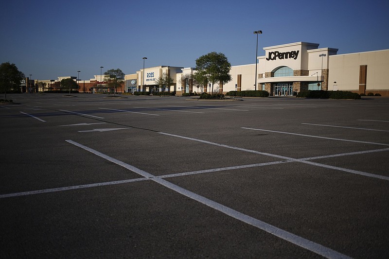 An empty parking lot is seen outside a closed JC Penney store in Mt. Juliet, Tenn., on April 16, 2020. MUST CREDIT: Bloomberg photo by Luke Sharrett.