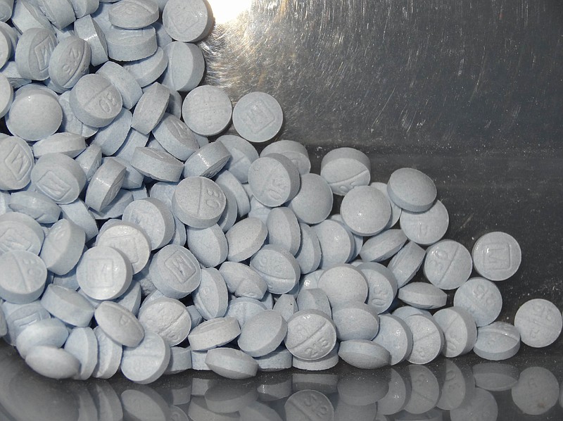 FILE - This photo provided by the U.S. Attorneys Office for Utah and introduced as evidence in a 2019 trial shows fentanyl-laced fake oxycodone pills collected during an investigation. In a resumption of a brutal trend, nearly 71,000 Americans died of drug overdoses in 2019 according to the Centers for Disease Control and Prevention, a new record high that predates the COVID-19 crisis. The numbers were driven by fentanyl and similar synthetic opioids, which accounted for 36,500 overdose deaths. (U.S. Attorneys Office for Utah via AP)