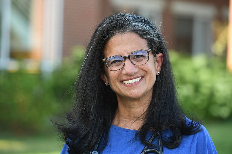 Dr. Huda Sharaf is the director of the University of Arkansas health clinic and is a member of the newly re-formed Fayetteville Health Board, reconfigured to study how the city can most safely navigate the post-covid-19 world. Dr Sharaf is seen here Monday July 13, 2020. Visit nwaonline.com/200705Daily/ for photo galleries. (NWA Democrat-Gazette/J.T. Wampler)