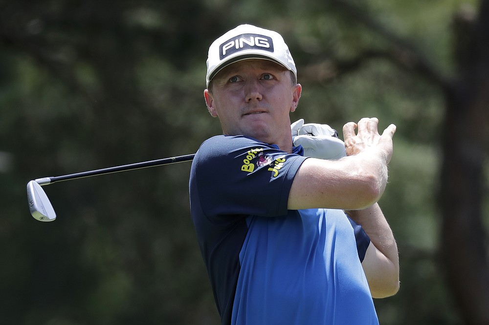 Mackenzie Hughes, of Canada, hits from the second tee during the third round of the Memorial golf tournament, Saturday, July 18, 2020, in Dublin, Ohio. (AP Photo/Darron Cummings)