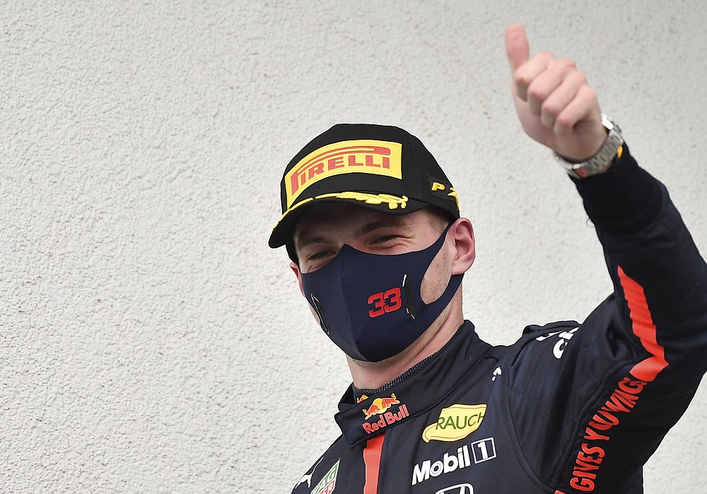 Second placed Red Bull driver Max Verstappen of the Netherlands celebrates after the Hungarian Formula One Grand Prix at the Hungaroring racetrack in Mogyorod, Hungary, Sunday, July 19, 2020. (Joe Klamar/Pool via AP)