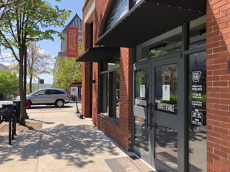 Experience Fayetteville's visitors bureau is seen Monday, April 20, 2020, at the downtown square. (NWA Democrat-Gazette/Stacy Ryburn)