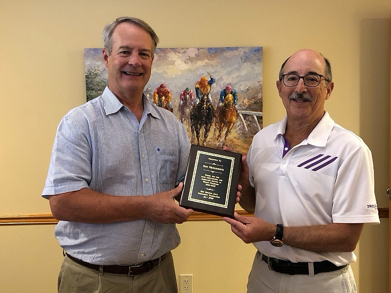 Dr. Stuart Fleischner, newly elected chairman of the Hot Springs Area Community Foundation Board, right, congratulates outgoing Chairman Dan Messersmith on his leadership and accomplishments. - Submitted photo