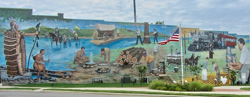 The Benton Mural stands 35 feet high and stretches 145 feet long in the Saline County seats downtown.

(Special to the Democrat-Gazette/Marcia Schnedler)