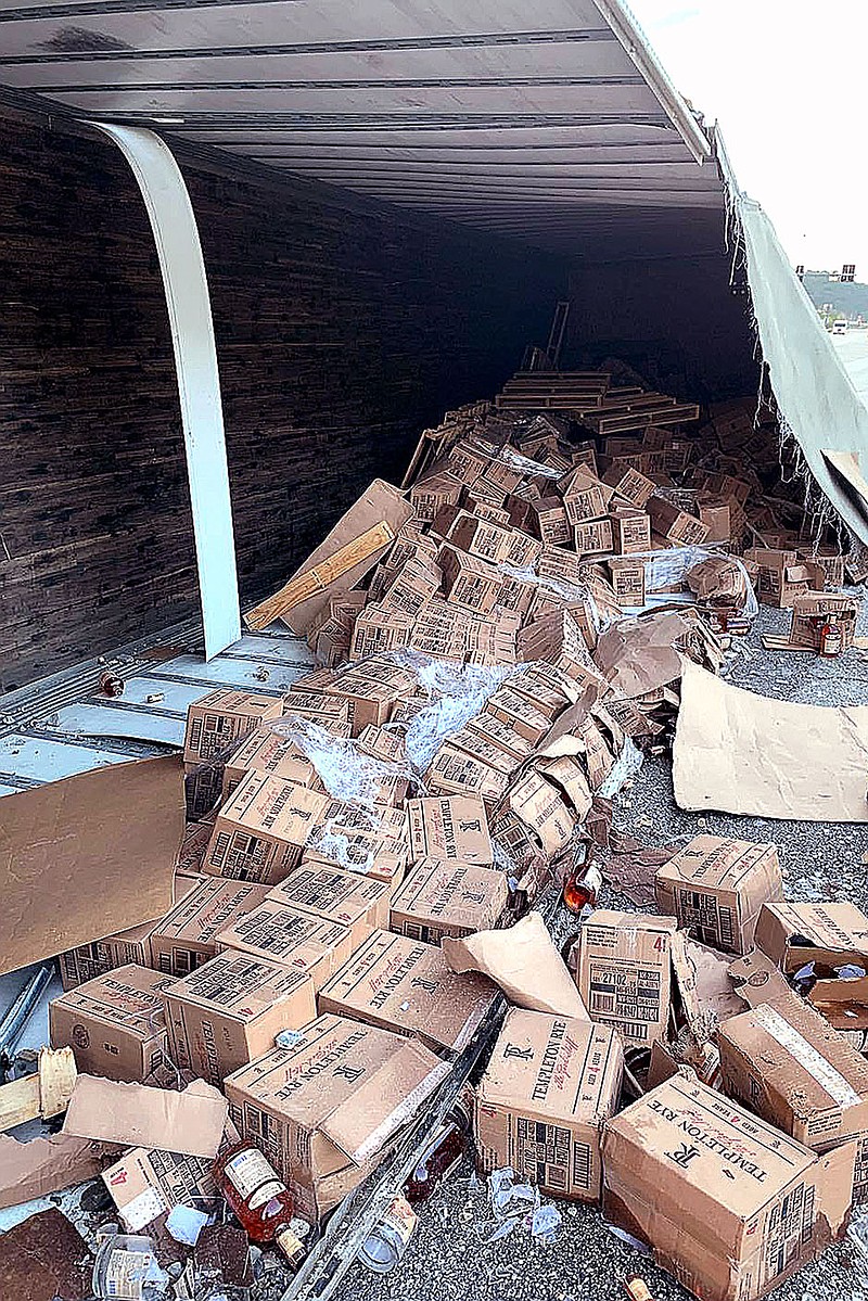 COURTESY PHOTO/The semi in question was hauling a load of Templeton Rye. Emergency responders worked from daybreak until mid-day to clear the vehicle from the roadway and remove any related debris.
