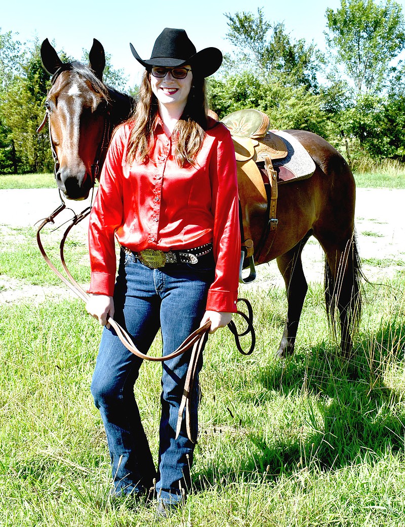 MARK HUMPHREY  ENTERPRISE-LEADER/Shania Downing, 15, daughter of Shane and Angelina Downing, of Farmington, is a candidate for Lincoln Riding Club Junior Queen. Shania competes with Ace, a 12-year-old Quarterhorse gelding. The pageant will be held Aug. 6-8 during the 67th annual Lincoln Rodeo.