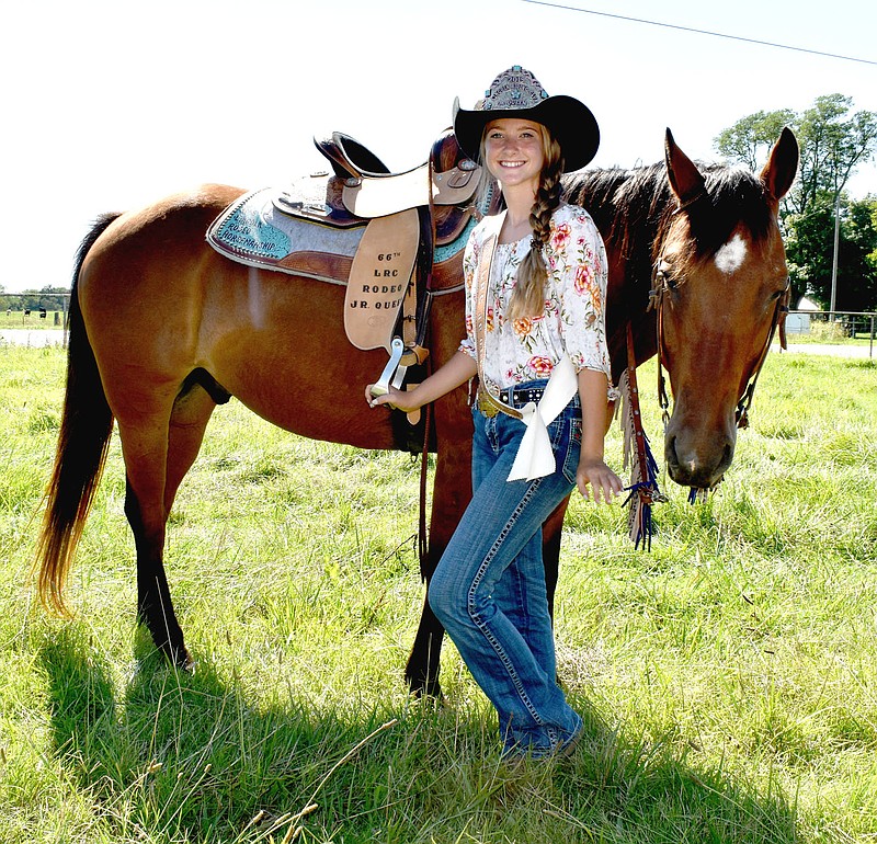 MARK HUMPHREY  ENTERPRISE-LEADER/Savannah Perkins, 13, daughter of Charlie and Christy Perkins, of Farmington, won the 2019 Lincoln Riding Club Junior Queen title. Savannah poses with Rowdy, a 12-year-old Quarterhorse gelding. The 67th annual Lincoln Rodeo will be held Aug. 6-8 at the Lincoln Riding Club Arena.