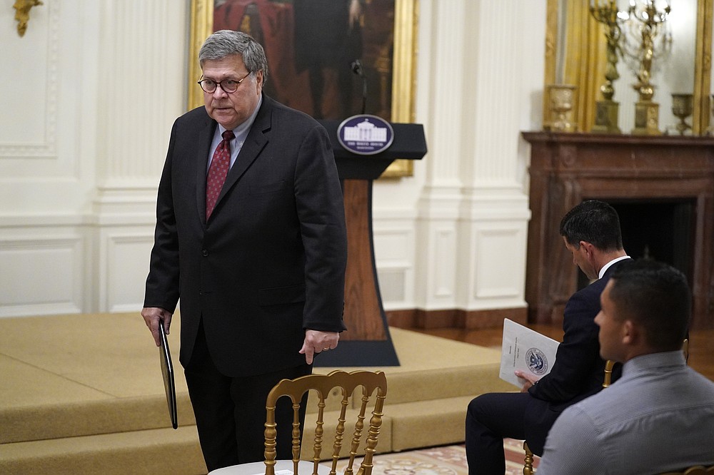 Attorney General William Barr arrives for an event on "Operation Legend: Combatting Violent Crime in American Cities," in the East Room of the White House, Wednesday, July 22, 2020, in Washington. (AP Photo/Evan Vucci)