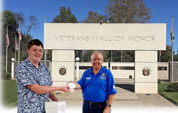 Photo submitted
Andrew Hull, (left)  co-owner of Crazy Willy’s Ice Cream donates almost $300 to the Veterans Walk of Honor expansion project handing off the funds to Ray Brust, President Veterans Council NWA. Crazy Willy’s operates next to the Veterans Memorial Park and works closely with the Veterans Council of NWA to provide a pleasant environment for the wall visitors. The Veterans Memorial Park is expanding and asks for the public's support and donations to add the next phase called  “Honor Our Veterans." Contact jlgarner@vetwallofhonor.org or visit the website, https://www.vetwallofhonor.org.