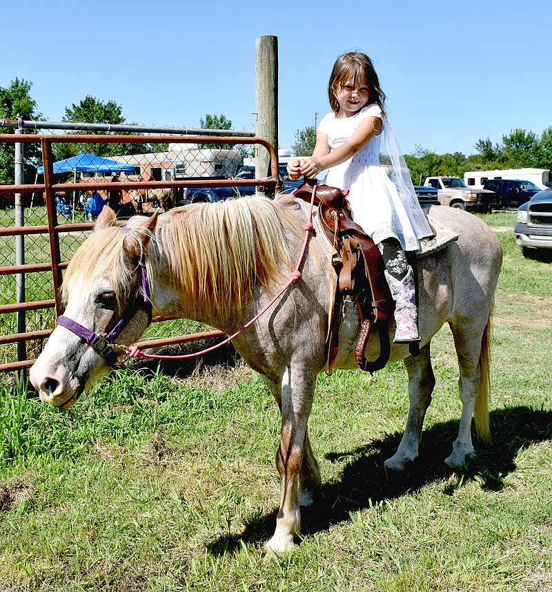 MARK HUMPHREY  ENTERPRISE-LEADER/Delilah Alvarez, 6, daughter of Kelby Alvarez, of Siloam Springs, and Melissa Brown, of Bentonville, is a candidate for the 2020 Lincoln Riding Club Lil' Miss. Delilah is riding Spirit, a 20-year-old strawberry roan. The 67th annual Lincoln Rodeo will be held Aug. 6-8 at the Lincoln Riding Club Arena.