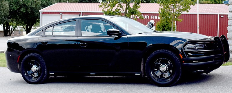 Westside Eagle Observer/MIKE ECKELS

The Decatur Police Department latest crime fighting tool, a 2020 Dodge Charger police cruser is parked on the south side of Decatur City Hall July 23 waiting for Chief Steven Grizzle to return from a meeting with the mayor. The specially built police car replaced the former chief's vehicle which was experience serious mechanical issues.