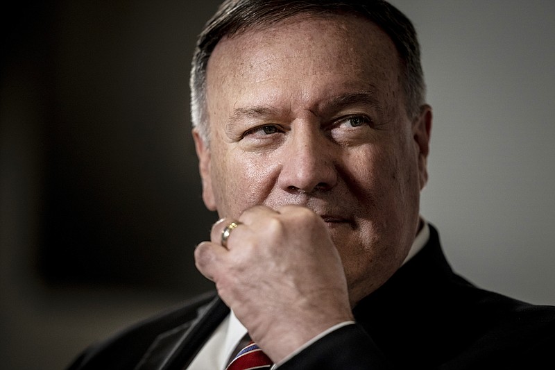 FILE - In this Wednesday July 22, 2020 file photo, US Secretary of State Mike Pompeo attends a press conference in Eigtved's Warehouse, in Copenhagen. Mike Pompeo said Wednesday the Soviet occupation and annexation of the Baltic states of Estonia, Latvia and Lithuania in 1940 was “a criminal act” and draws parallel with present-day Russia’s military maneuvers in Ukraine and Georgia. (Mads Claus Rasmussen/Pool Photo via AP, File) story.lead_photo.caption