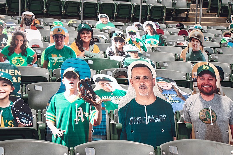 The Oakland Athletics baseball team shows fan cutouts in the stands at RingCentral Coliseum, the Athletics home field, in Oakland, Calif., on July 15. - Photo by Kyle Skinner of The Associated Press