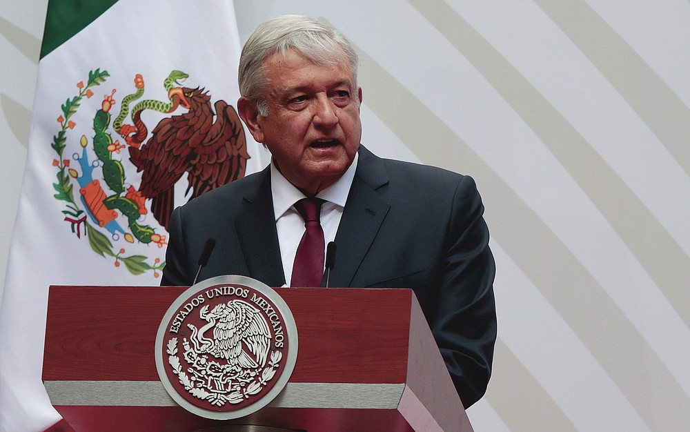 FILE - Mexican President Andres Manuel Lopez Obrador speaks at the National Palace in Mexico City on April 5, 2020. The countries which top the rankings of COVID-19 deaths globally are led by populist, mold-breaking leaders like Obrador. The U.S., Brazil, the United Kingdom and Mexico all are led by leaders who have been skeptical of the scientists and who initially minimized the disease. And their four countries alone account for half of the total 585,000 COVID-19 deaths worldwide so far, according to statistics tracked by Johns Hopkins University. (AP Photo/Eduardo Verdugo, File)