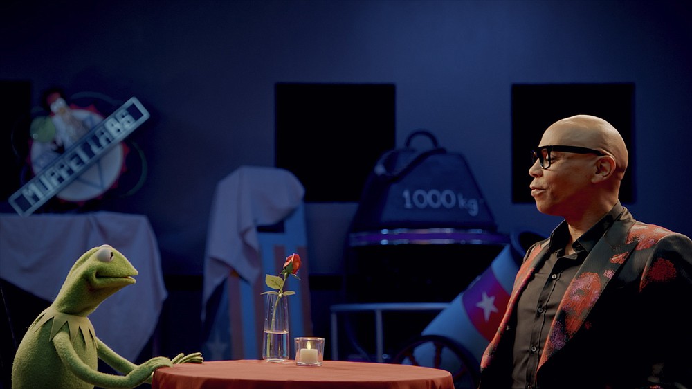 Kermit the Frog and guest star RuPaul have a little talk in a scene from an episode of “Muppets Now.”
