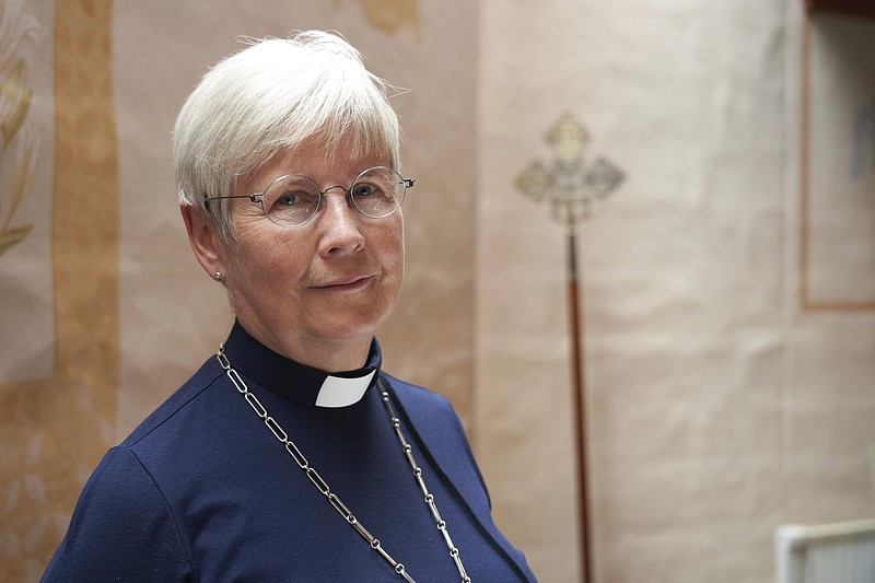 Rev. Cristina Grenholm, head of theology and Secretary of the Church of Sweden poses for a portrait in Uppsala,  Sweden, Tuesday, July 21, 2020. For the first time ever, there are more female than male priests inside the Church of Sweden, according to numbers released this month, a sign that gender equality has made huge strides since the first woman was ordained in Sweden in 1960. (AP Photo/David Keyton)